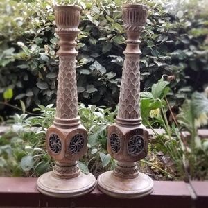Carved wood and metal work candle sticks.